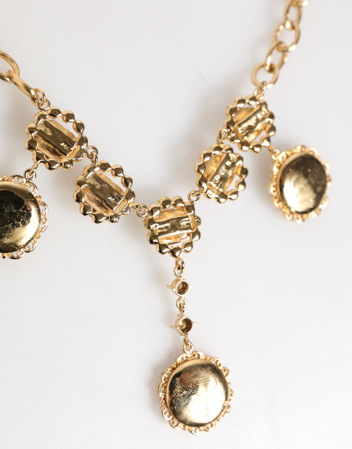 Dolce & Gabbana guld klockhänge med kristaller statementhalsband